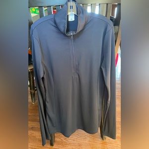 Sunshirt from Ocala - Ladies XS. Plain front and back. Embroidered on sleeve.